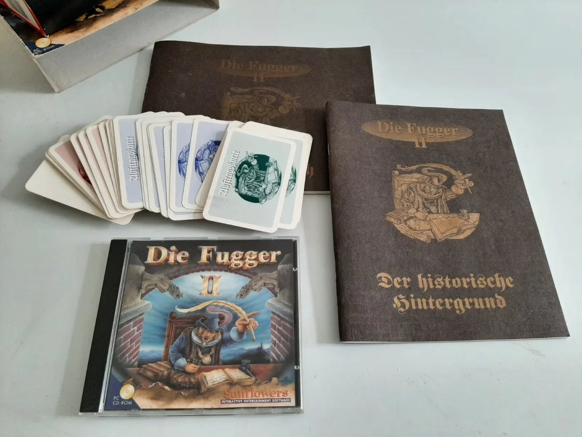Die Fugger II von Sunflowers – Jewelcase, Anleitung, Hintergrundheft und Auftragskarten