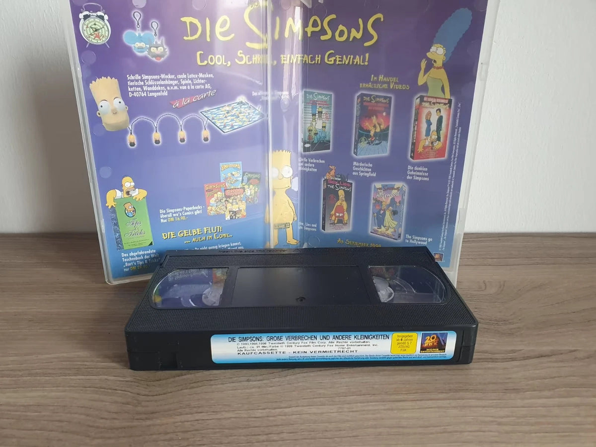 Originale Simpsons Kaufkassette mit geöffnetem farbigem Werbeinlay