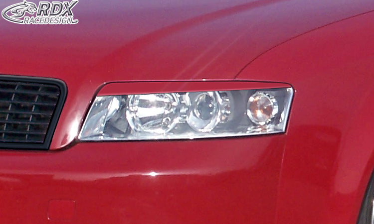 Lackiertes Montagebeispiel am Audi A4 B6 – angeboten wird Schwarz natur, Fahrzeug und Scheinwerfer nicht enthalten